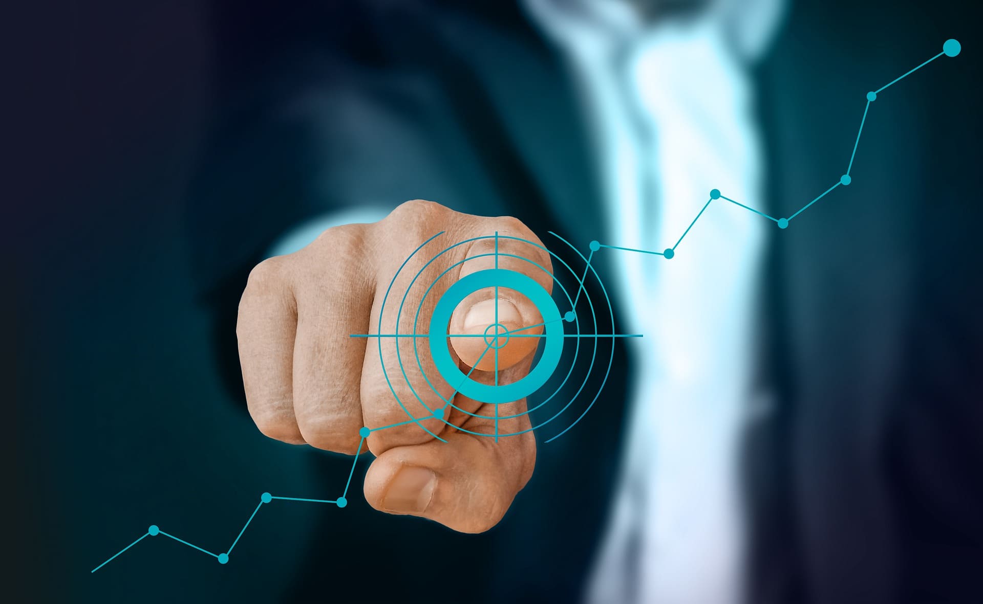 India-UAE Business Setup - A person in business attire points at a virtual target overlaid on a rising graph.